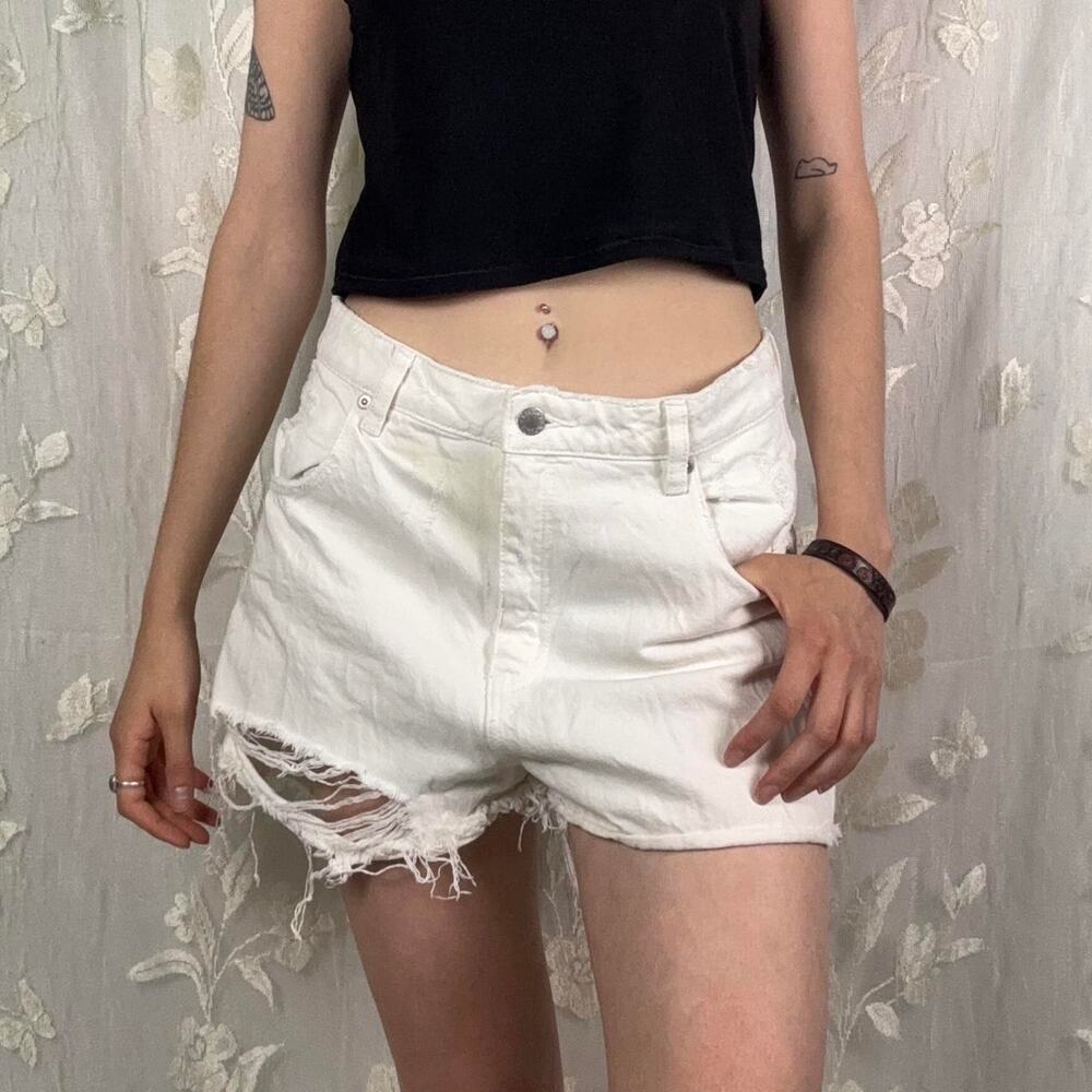 Rolla's white denim shorts with a distressed look